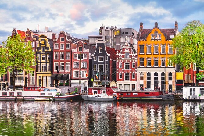5 hrs Golden Age Amsterdam Private Walking Tour With Local Guide - Centraal Station, St. Nicholas Basilica, and the medieval harbor edge
