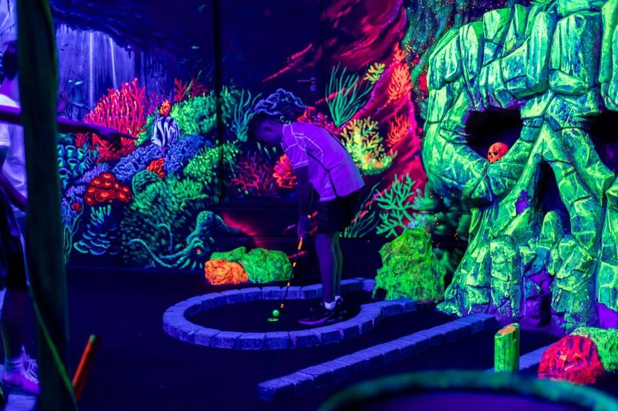 Aloha Amsterdam: 12-Hole Glow-in-the-Dark Mini-Golf - Finding Aloha Amsterdam under the flyover