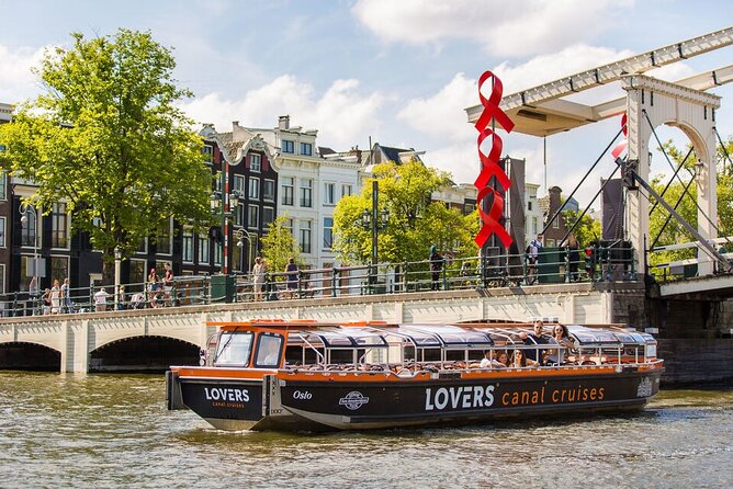 Amsterdam 1h Canal Cruise by Semi-Open Boat with Audio Guide - A gentle introduction to Amsterdam from the water