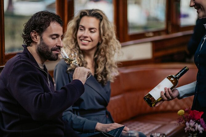 Amsterdam: 2-Hour Canal Cruise incl. Drinks & Dutch Snacks - Munt Tower, Cat Cabinet, and unusual Amsterdam