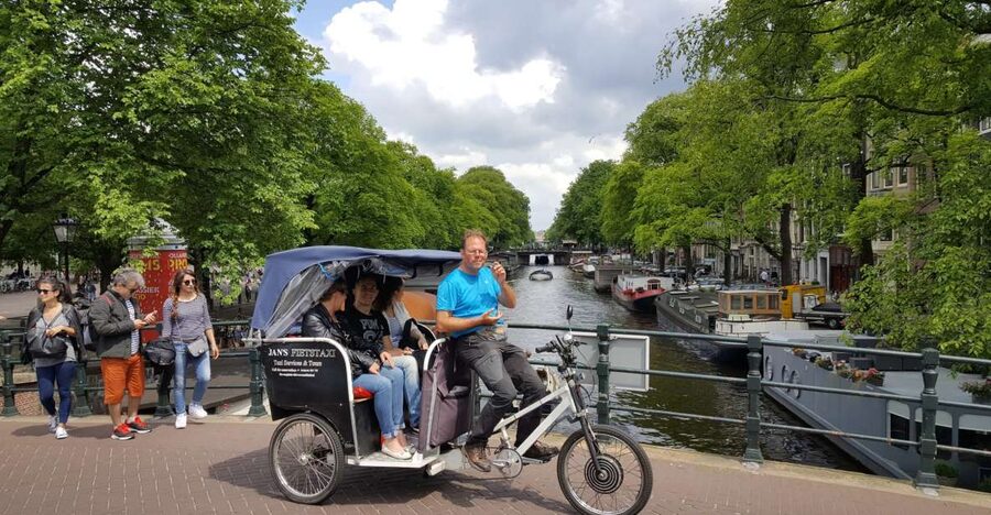 Amsterdam: 2-Hour Sightseeing Tour by Rickshaw - Red Light District and coffee shops, handled as part of the city