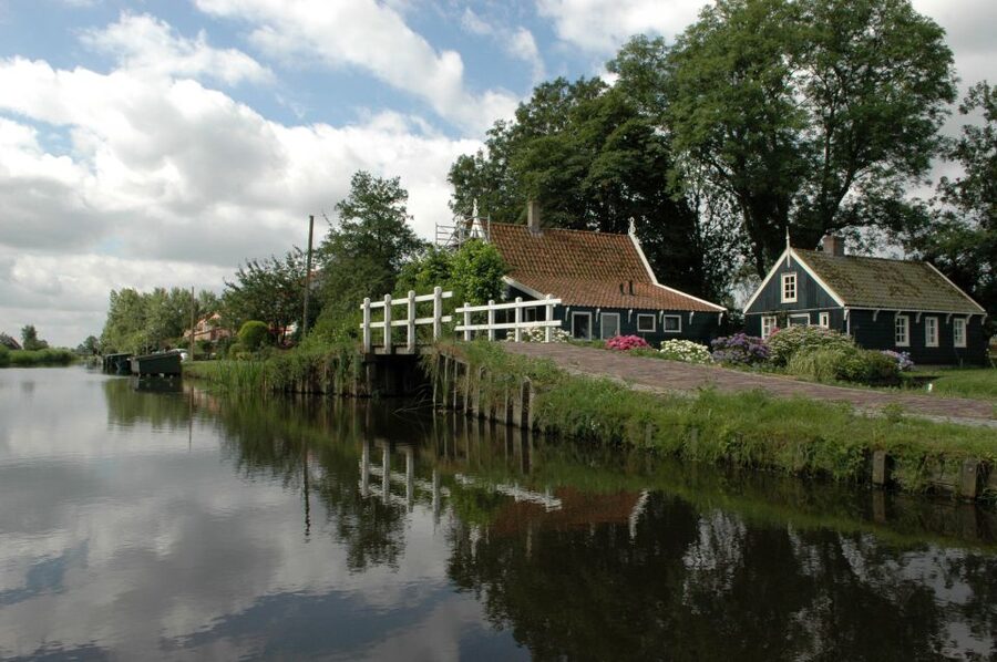 Amsterdam 5-Hour Guided Canoe Trip in the Wetlands - Windmills on the return route