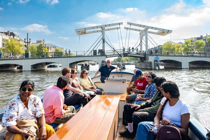 Amsterdam: 75 minute Open Boat Canal Cruise with Live Guide - Starting opposite the Hard Rock Cafe