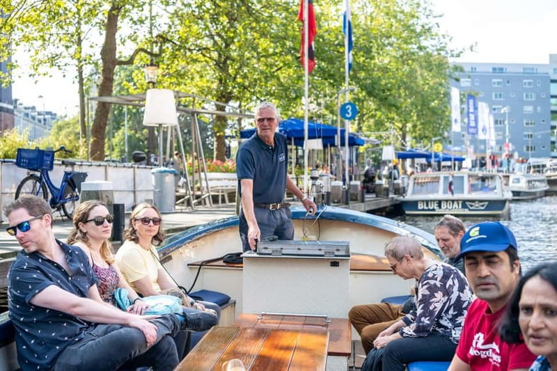 Amsterdam: 75 minute Open Boat Canal Cruise with Live Guide - Westerkerk, Prinsengracht, and the Anne Frank House area