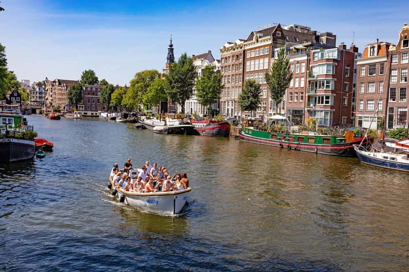 Amsterdam: 75 minute Open Boat Canal Cruise with Live Guide - The Museum Quarter on the return route