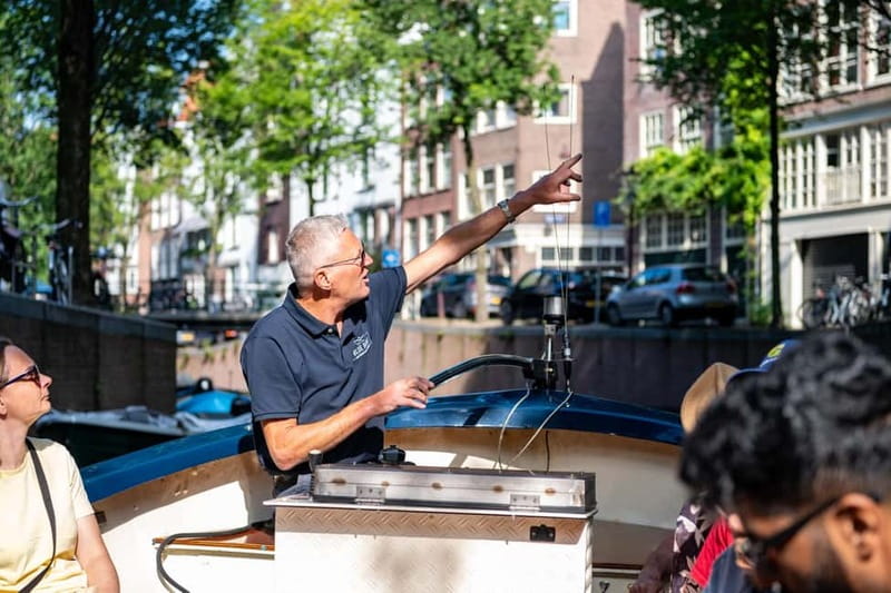 Amsterdam: 75 minute Open Boat Canal Cruise with Live Guide - From Leidseplein to the city center