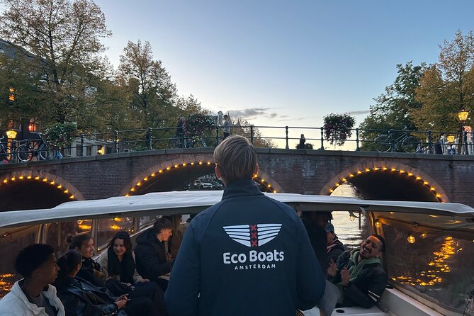 Amsterdam: 90 min Kings Day Boat Party with Unlimited Drinks - Seeing Amsterdam’s UNESCO canal ring