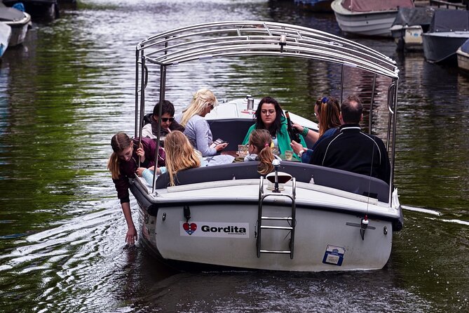 Amsterdam 90-min Private Canal Cruise with Live Guide and Drinks - The UNESCO canal belt and Amsterdam’s Golden Age