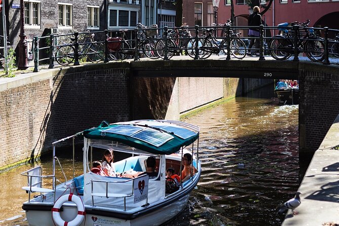 Amsterdam 90-min Private Canal Cruise with Live Guide and Drinks - Dancing Houses and Monet’s Amsterdam