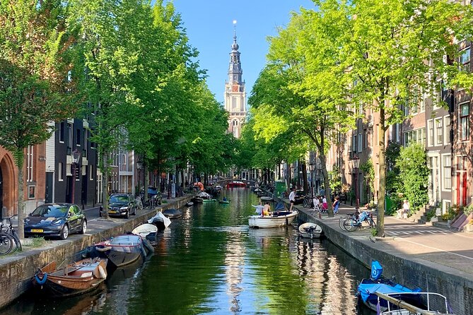 Amsterdam : Anne Frank Tour in EN/DE/IT/ES - Starting at the Waag in Nieuwmarkt