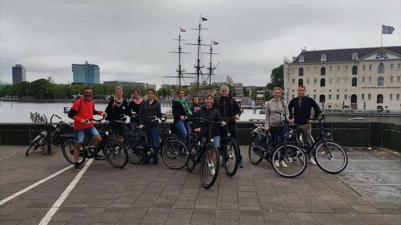 Amsterdam bike tour with a French-speaking guide local! - Dam Square and the old city center