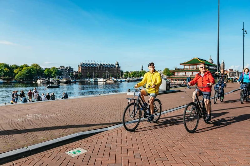 Amsterdam: Bike Tour with Optional Cruise in Small-Group - Magere Brug beside the Amstel
