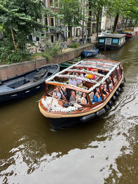 Amsterdam: Boat Tour with Optional Unlimited Drinks - From Oude Kerk to the Red Light District