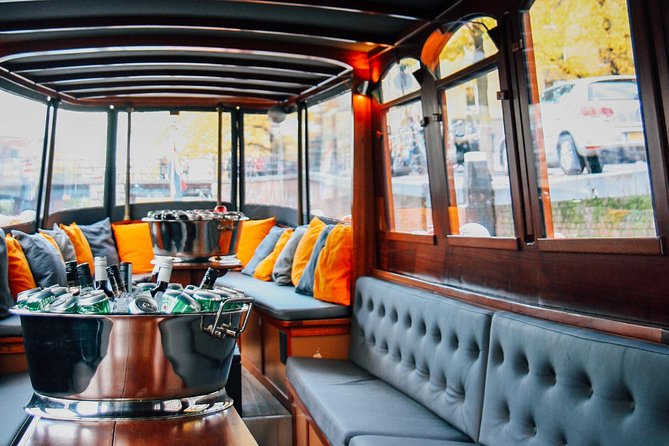 Amsterdam Canal Cruise in Classic Salon Boat With Drinks and Cheese - Seeing Amsterdam from a classic salon boat