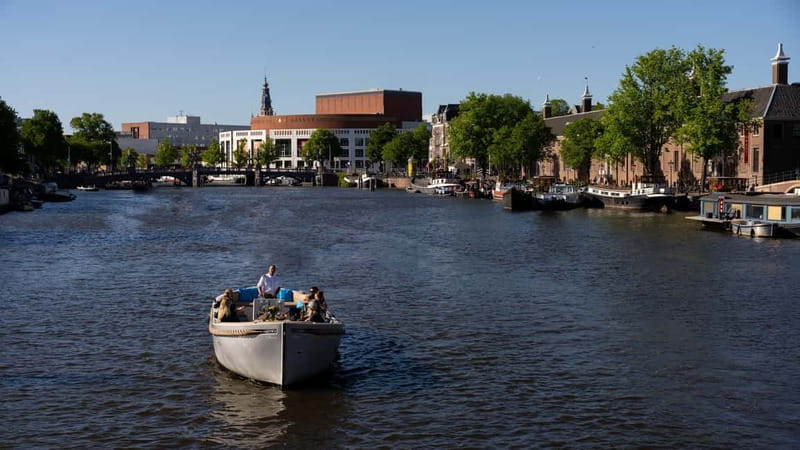 Amsterdam: Canal Cruise in Open Boat with Drink Option - Prinsengracht and Amsterdam’s canal houses