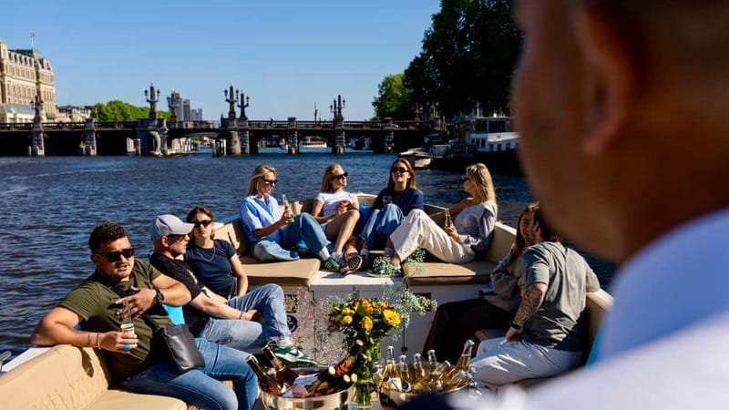 Amsterdam: Canal Cruise in Open Boat with Drink Option - Choosing Central Station or the Anne Frank House