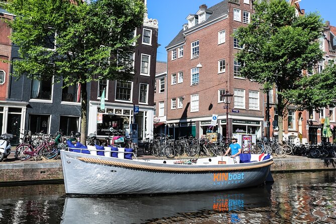 Amsterdam Canal Cruise in Open Boat with Unlimited Drinks Option - Weather, timing, and meeting-point advice