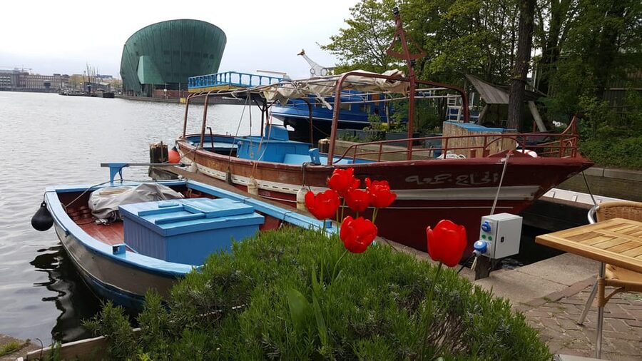 Amsterdam: Canal Cruise on a Wooden Refugee Boat - Personal stories that change the pace
