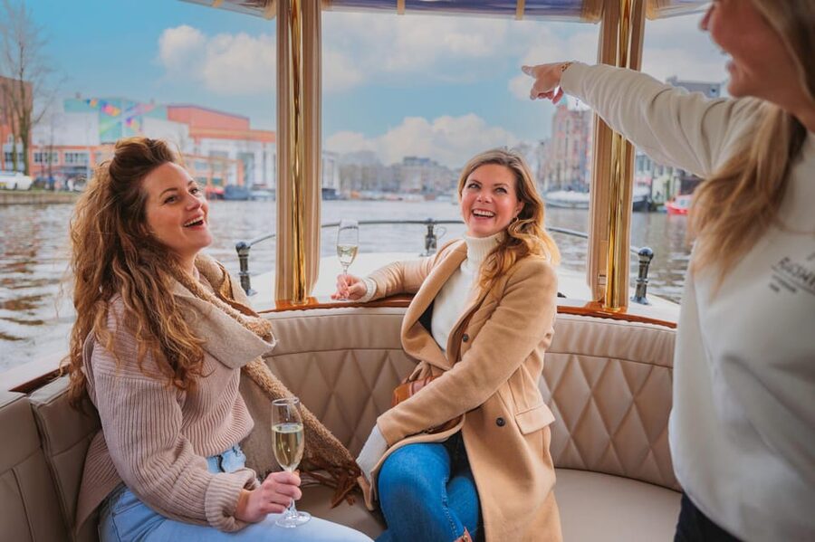 Amsterdam: Canal Cruise with Bubbles & Bites - What the crew adds to the ride