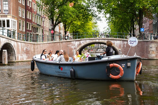 Amsterdam Canal Cruise with Dutch Pancakes and Drinks - Poffertjes and a drink while the city drifts past