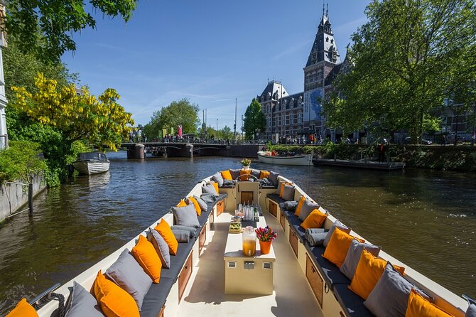 Amsterdam Canal Cruise with German Guide and unlimited drinks - Houseboats and the calmer side of Amsterdam