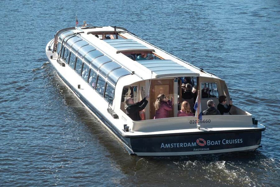 Amsterdam: Canal Cruise with Live Commentary & Audio Guide - Live stories, audio, and the human touch