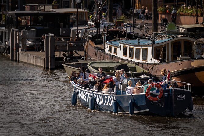 Amsterdam Canal Cruise with Live guide & Two drinks - Central St. - Small canals, old streets, and changing views