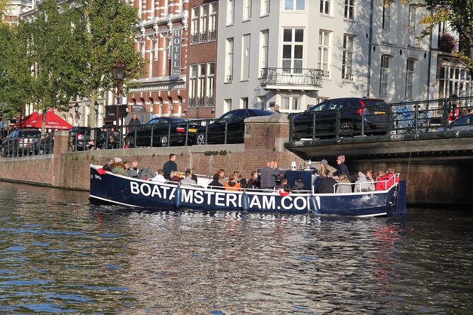 Amsterdam Canal Cruise with Open Bar - Central Station - Canal Museum, Bartolotti House, and Munt Tower