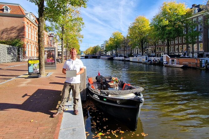 Amsterdam Canal Tour by Open Boat – 90 min Small Group Experience - Geldersekade, Chinatown, and de Waag