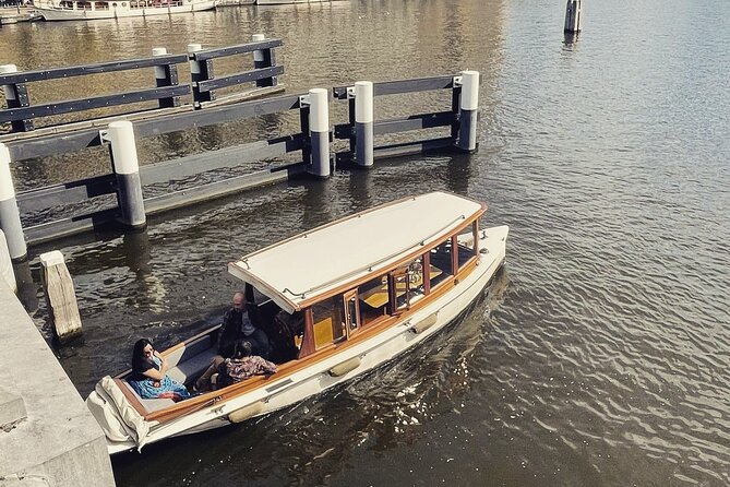 Amsterdam Champagne Private Canal Cruise - Guides Scott and Carl shape the experience