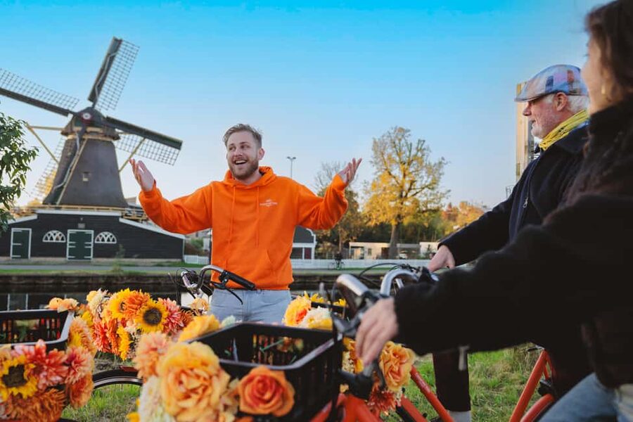 Amsterdam: Cheese, Windmill & Countryside Bike Tour - Leaving Amsterdam by Ferry and Bike