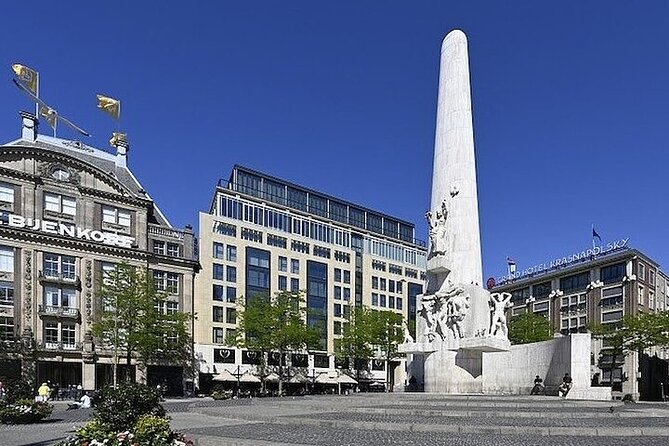Amsterdam City Center, Red Light District and Coffee Shops Tour - The National Monument adds a quiet pause