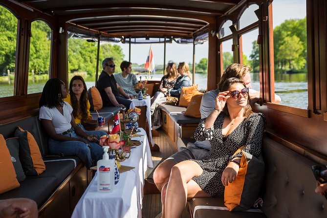 Amsterdam Classic Saloon Boat Cruise with Drinks and Cheese - Dutch cheese, mustard, and unlimited drinks