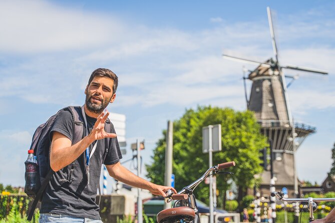 Amsterdam Countryside Bike Tour - Leaving Centraal Station by bike and ferry