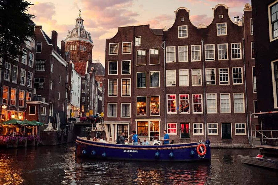 Amsterdam: Cozy Evening Canal Cruise With Open Bar Option - Why Amsterdam’s canals are best seen from a low boat