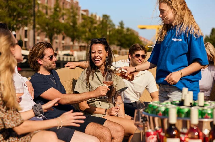 Amsterdam: Cozy Evening Canal Cruise With Open Bar Option - The Red Light District, Sea Palace, and NEMO