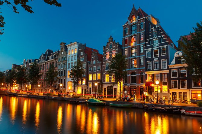 Amsterdam Evening Canal Cruise with Live Guide and Onboard Bar - Royal Theatre Carré and the Amstel