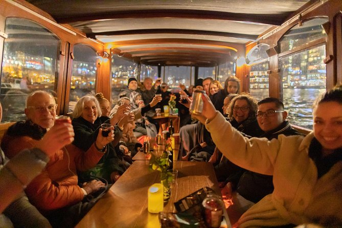Amsterdam Evening Canal Cruise with Live Guide and Onboard Bar - Rijksmuseum, the Flower Market, and the Mint Tower