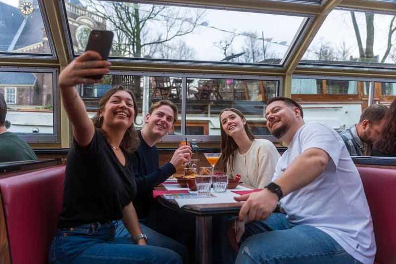 Amsterdam: Evening Cocktail Cruise along the canals - From Centraal Station to the first canal views