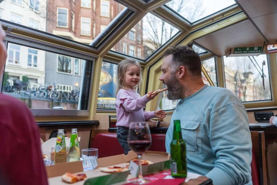 Amsterdam: Evening Pizza Cruise Along the Canals - The first canals: Damrak, Centraal, and Brouwersgracht