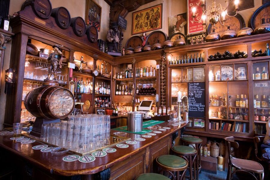 Amsterdam: Exclusive Red Light District Tour and Drink - Warmoesstraat, windows, bars, and nightclubs