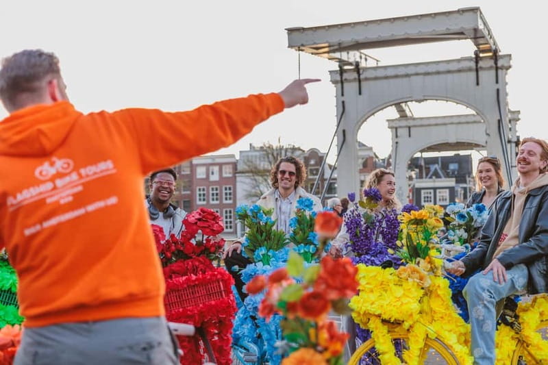 Amsterdam: Explore Canals, Guided Tour on Flower Bikes - Dam Square and the ride back