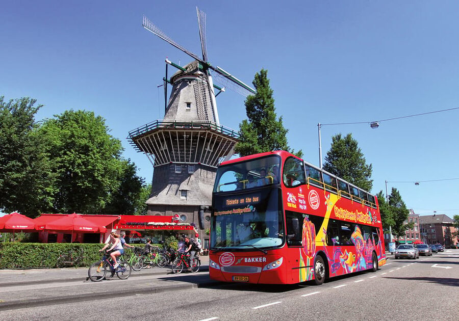 Amsterdam: Explore Pass with Over 35 Attractions - Canal cruises and the water-side view of Amsterdam