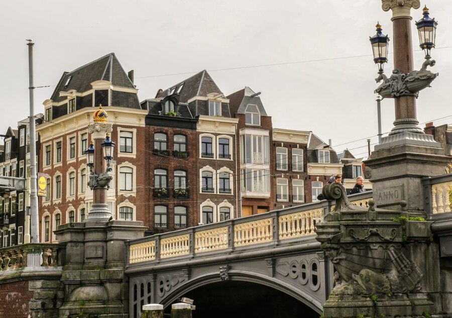 Amsterdam: German Canal Cruise with Unlimited Drinks Option - Magere Brug and the Amstel