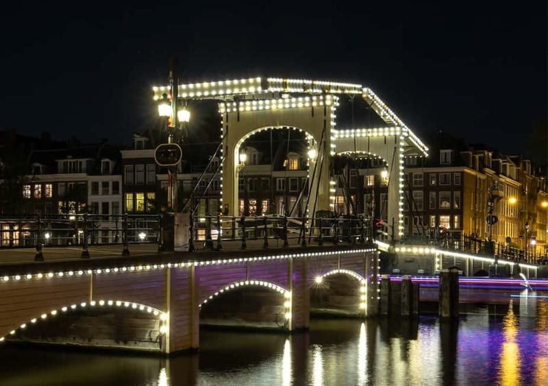 Amsterdam: German Canal Cruise with Unlimited Drinks Option - Muntplein and the return through central canals