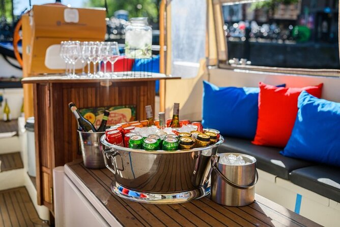 Amsterdam: German-speaking boat trip with bar on board - From Amstel 178 into central Amsterdam