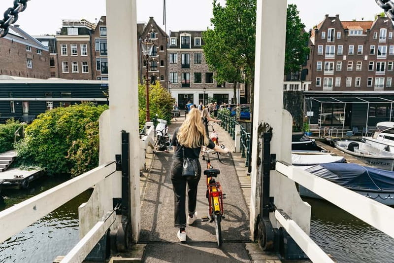 Amsterdam: Guided Bike Tour City Centre in EN/DE/FR/ES - Key points at a glance