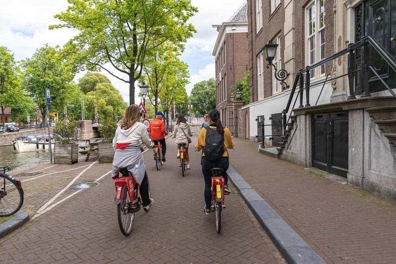 Amsterdam: Guided Bike Tour City Centre in EN/DE/FR/ES - Starting near Amsterdam Central Station
