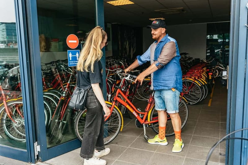 Amsterdam: Guided Bike Tour City Centre in EN/DE/FR/ES - Westerkerk and the Anne Frank House area