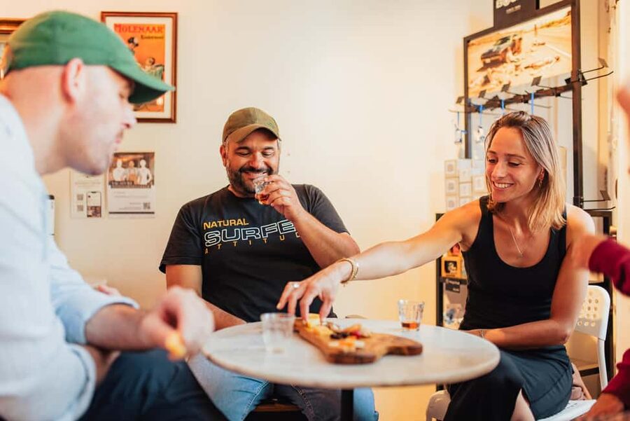 Amsterdam: Guided Cultural Food Tour in German or English - Damrak, Beurs van Berlage, and Magna Plaza